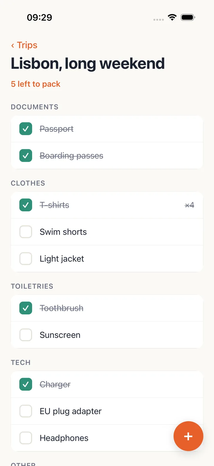Kitlist on a streamed iPhone: the Lisbon trip with 5 left to pack, items grouped under Documents, Clothes, Toiletries and Tech, packed rows ticked green and struck through.
